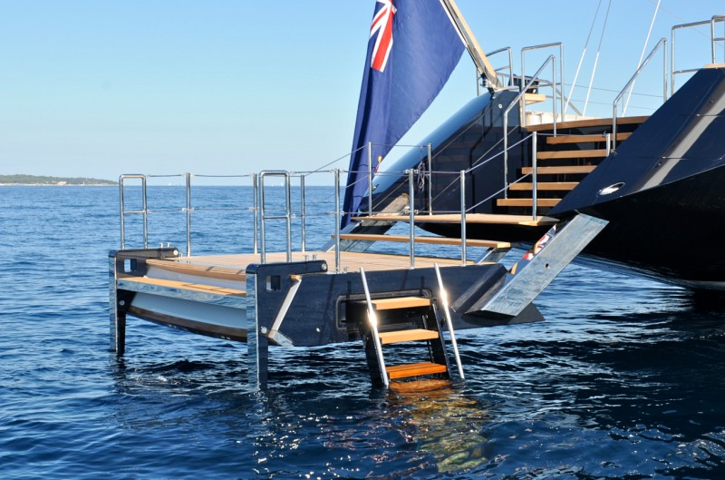 C-Quip swim stairs installed at a yacht swim platform and extended into the water